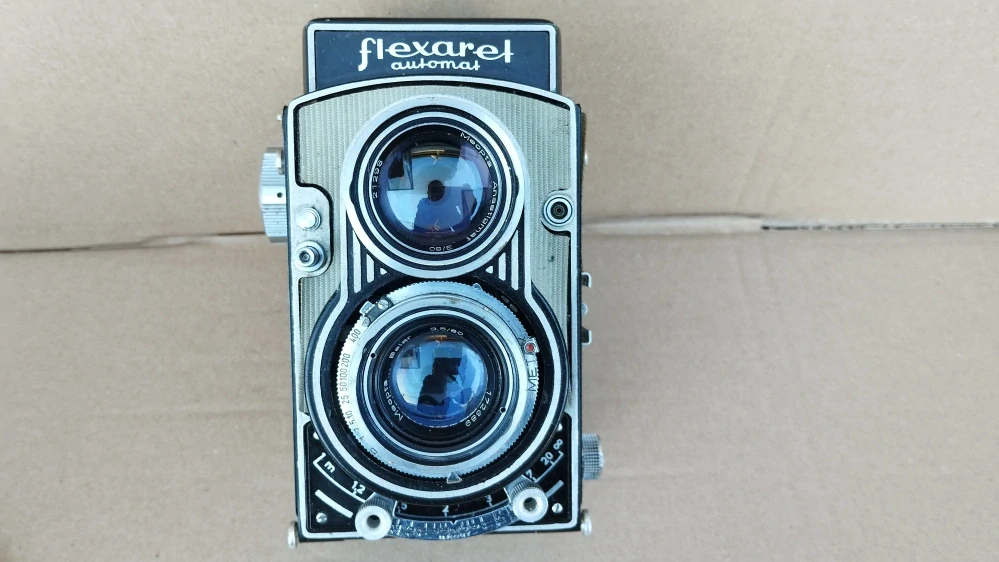 Starý fotoaparat FLEXARET 6 s kož.obalem, krytkou.