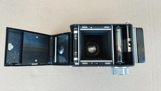 Starý fotoaparat FLEXARET 6 s kož.obalem, krytkou.
