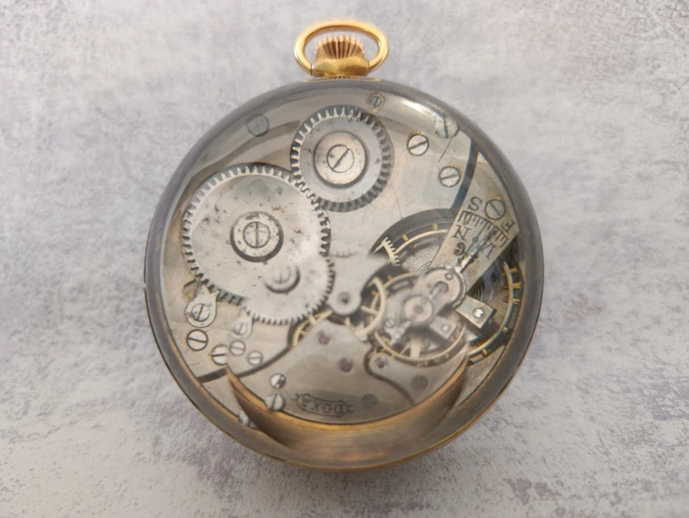 Starožitné hodinky DOXA ve skleněné kouli – erotický myslivecký motiv, Švýcarsko cca 1920–1930, rarita