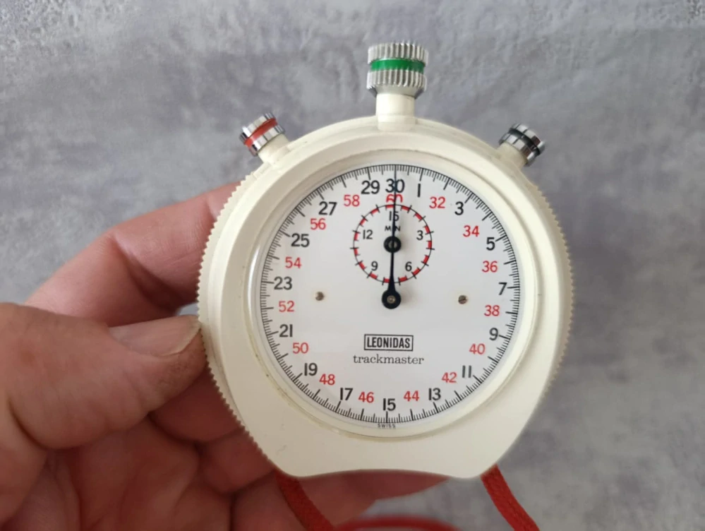 Vintage stopky Leonidas (Heuer) Trackmaster – Švýcarsko, originální krabička + návod, funkční
